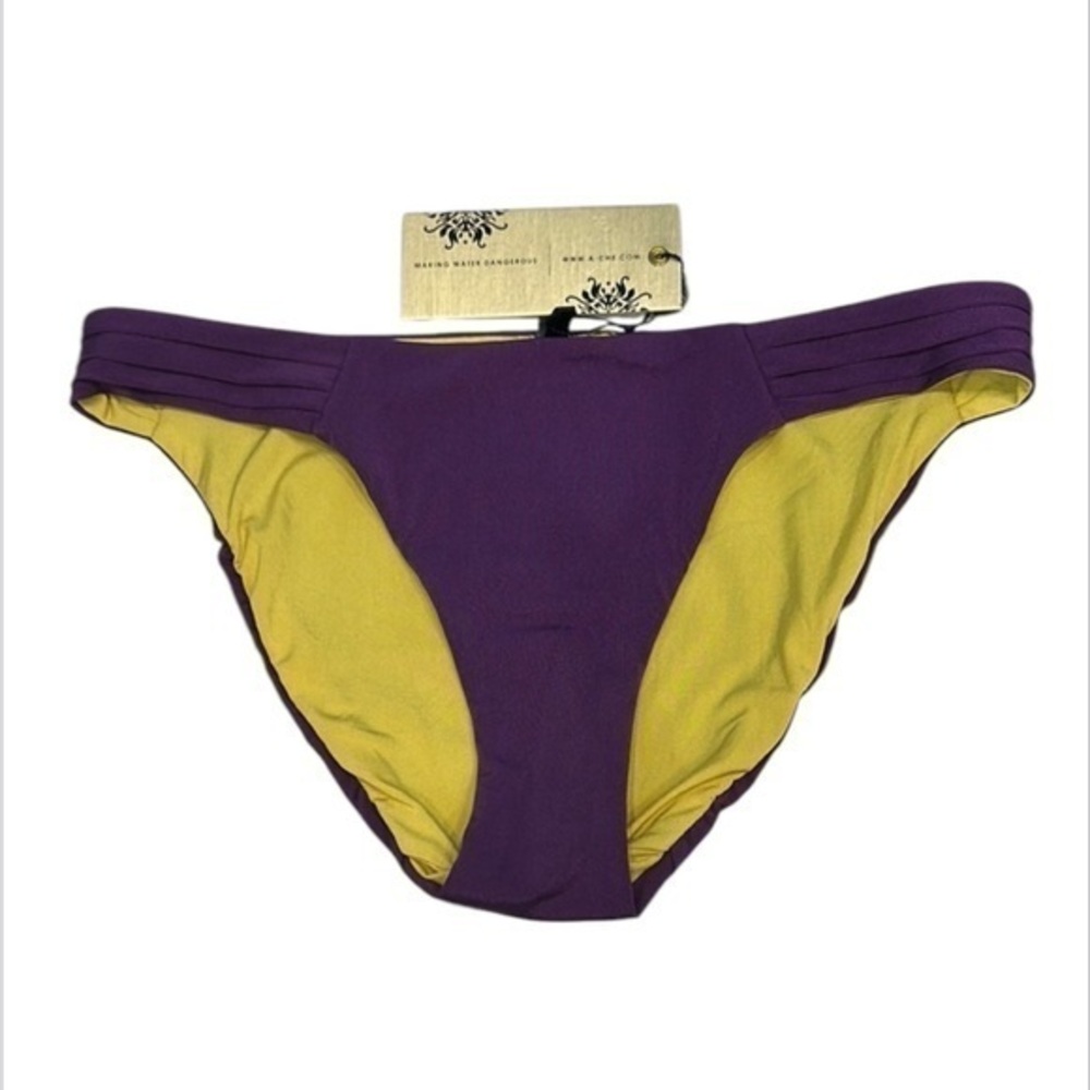 A. Che reversible swim bikini bottom Purple yellow size small